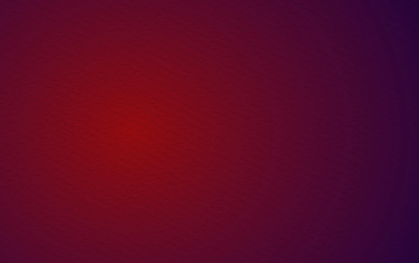 A vibrant red and purple background illuminated by a soft white light at the center